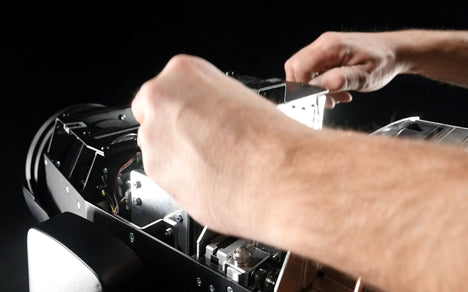 Framing module being removed from a JB Lighting P18 MK2 (photo shows the module in use)